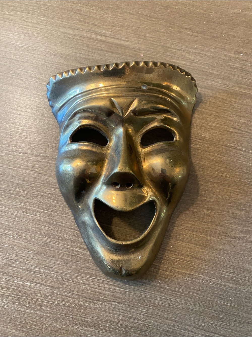 Brass mask wall hanger